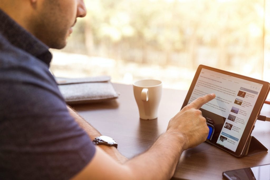 A customer using his tablet